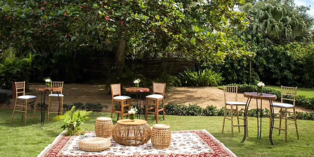 Caicu Wet Bar outdoor garden reception setup at Zoetry Agua Punta Cana