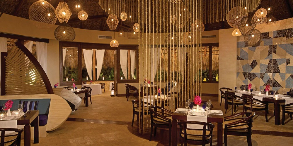 Elegant indoor reception setup at Piragua Restaurant in Zoetry Agua Punta Cana