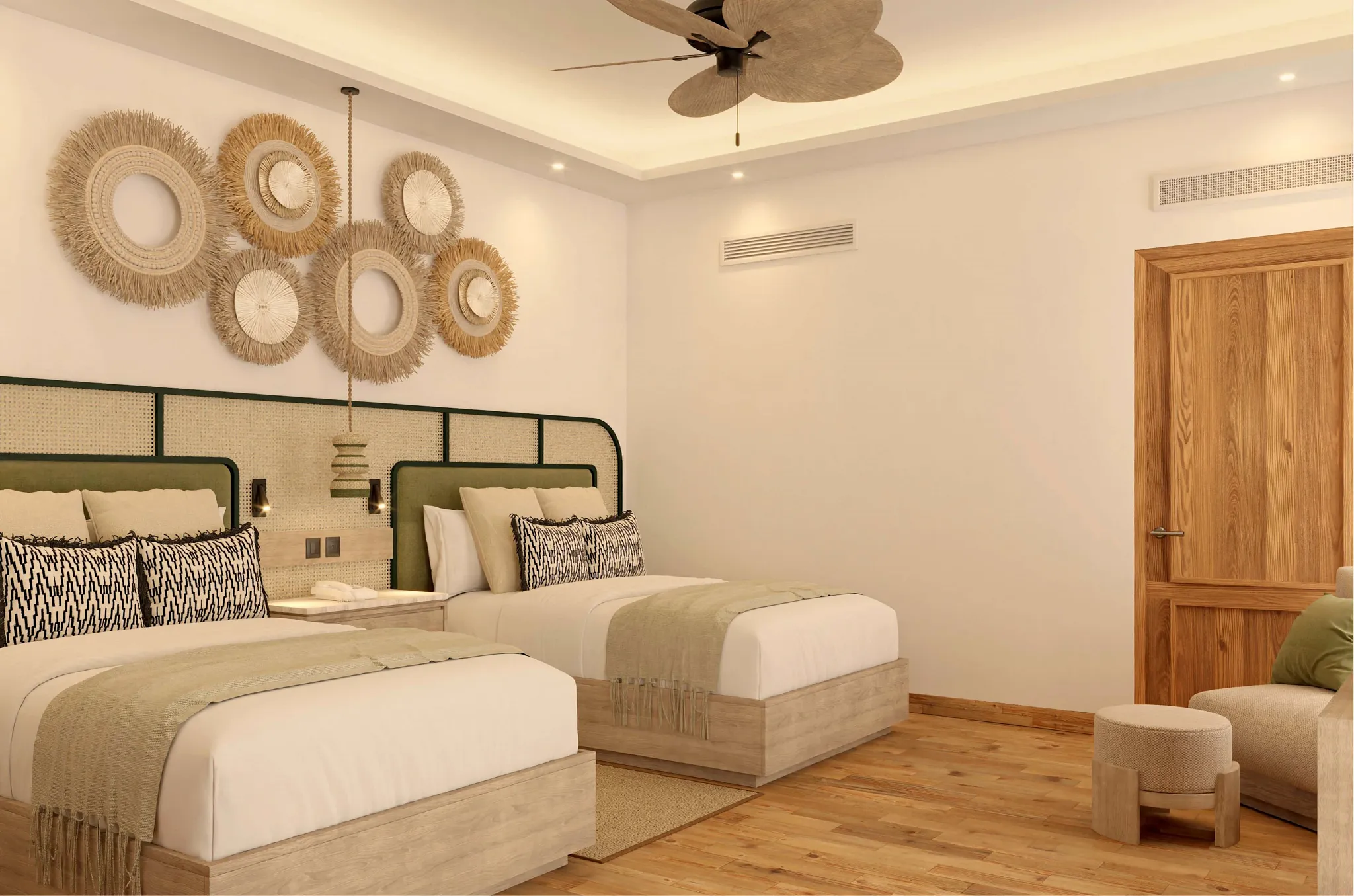 Junior Suite Pool View with two queen beds at Zoëtry Agua Punta Cana overlooking the pool.