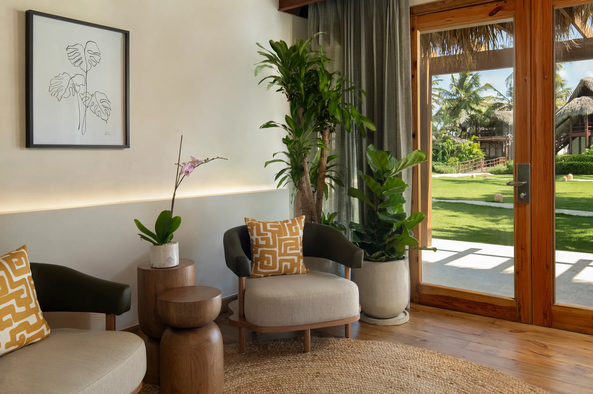 Villa Caribe Garden View foyer seating area with garden access at Zoëtry Agua Punta Cana.